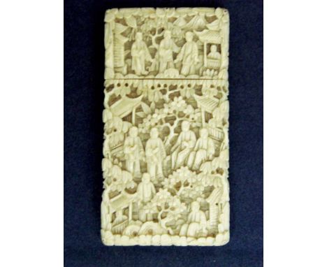 A Cantonese ivory Calling Card Case of rectangular form, deep carved to all sides with figures in garden landscape featuring 