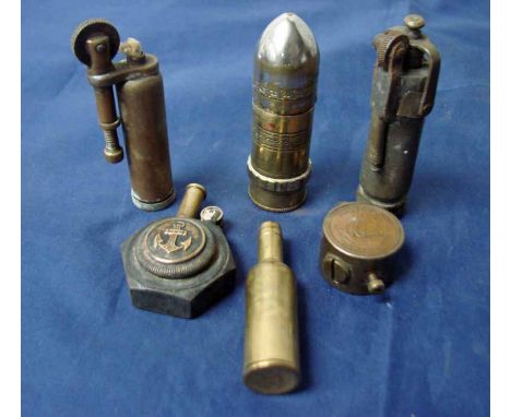 Six trench lighters incl German Navy button and British halfpenny 
