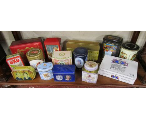 Shelf of vintage biscuit tins etc