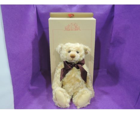 A modern Steiff limited edition 2000 Blond 43 Teddy Bear having growling mechanism and white tag 7822, with certificate and b