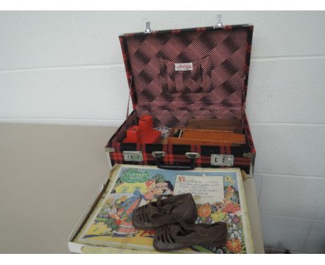A travel case containing a Viewmaster with slides, Dominoes, Draughts, a pair of children's vintage shoes etc