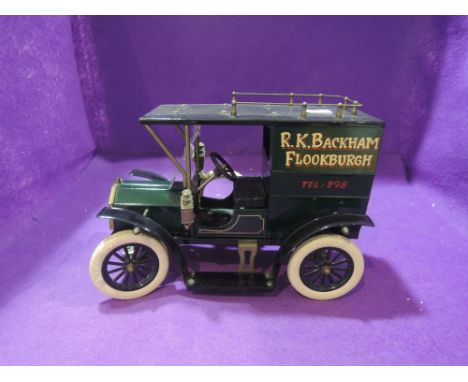 A tin plate Model T having JB Balloon-Tyres and advertising decal, R K Backham Flookburgh Tel 298, this shop is no longer tra