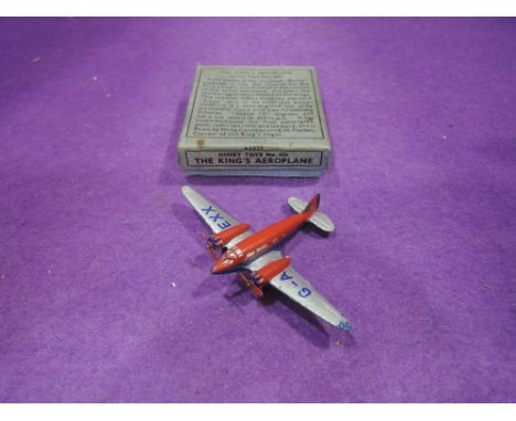 A Dinky Toys diecast, The Kings Aeroplane 62K in grey having red and blue fuselage and engine covers, registration details G-