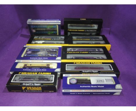 A large collection of N Gauge locomotives, Two Car DMU, Rolling Stock and accessories including Graham Farish Bachmann Northe