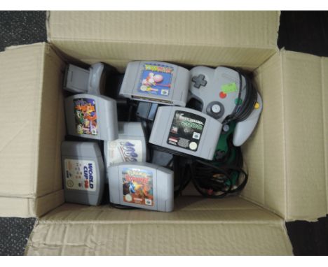 A Nintendo 64 console with two controllers, transfer pak and multi-tap along with seven games, World Cup 98, Banjo Kazoie, Po