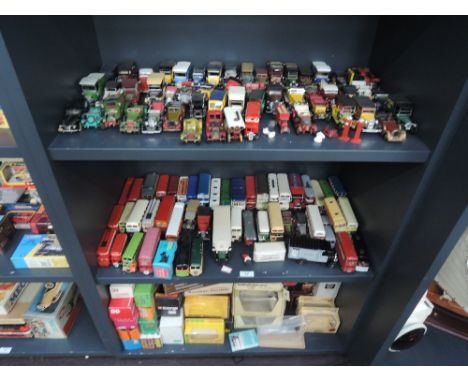 Two Shelves of mixed diecasts including Matchbox Models of Yesteryear, Corgi, Rio, EFE and similar buses etc along with a she