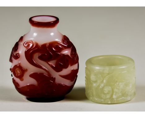A Chinese Peking Glass Snuff Bottle, with designs representing good fortune and longevity, 2.25ins (5.6cm) high, and a Chines