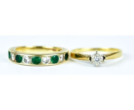 Two Gem Set Rings, Modern, 18ct gold, comprising - small illusion set solitaire diamond, size P, a nine stone diamond and eme