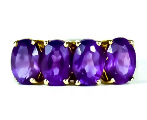 A Four Stone Faceted Amethyst Ring, 20th Century, 9ct gold set with four faceted amethysts, approximately 2ct total, size O, 