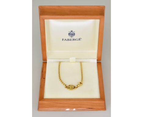 An 18ct Gold Necklace, Modern, by Faberge, 420mm in length, with enamel clasp depicting Russian Imperial Eagle, total gross w