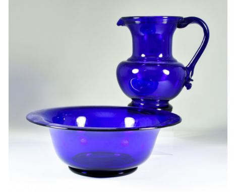 A Bristol Blue Glass Jug and Matching Basin, the jug with string moulding to under-rim and raspberry prunt to lower handle te