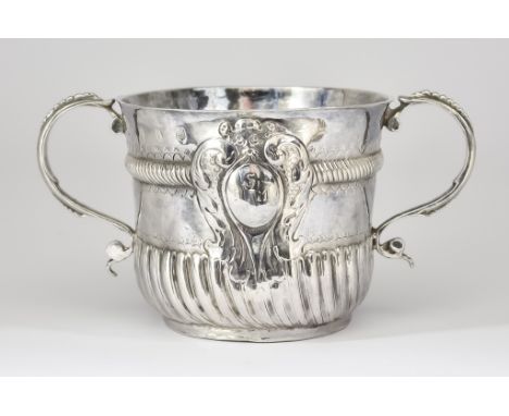 A William III Britannia Silver Two-Handled Porringer possibly by Robert Peake, London 1699, the body with reeded and fluted o