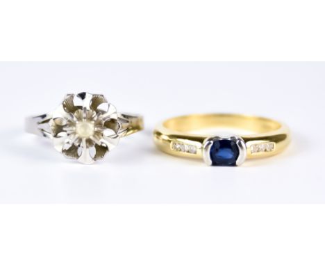 A Sapphire and Diamond Ring, Modern, 18ct gold, set with a centre sapphire,  approximately .3ct, flanked by six small diamond