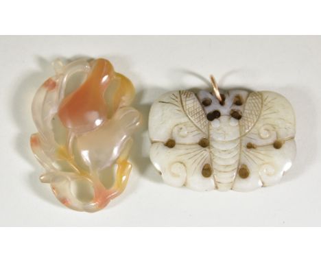 A Carved Jade Pendant, in the form of an insect, 50mm x 35mm, suspended from an 18ct gold ring, and one other carved agate pe