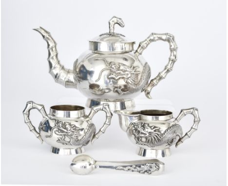 A Chinese Export Silver Four Piece Tea Service, Late 19th/Early 20th Century by Tuck Chang &amp; Co. Shanghai, cast with drag
