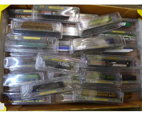 Twenty-eight 'N' gauge model locomotives, packaged 