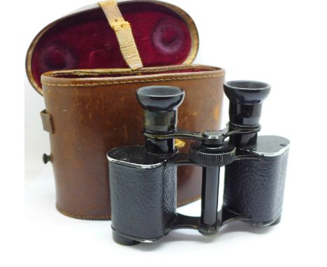 A pair of ETABL series 6 Broad Arrow 7x binoculars, embossed TS AFSA Paris Series MG S2 22682, with leather case 