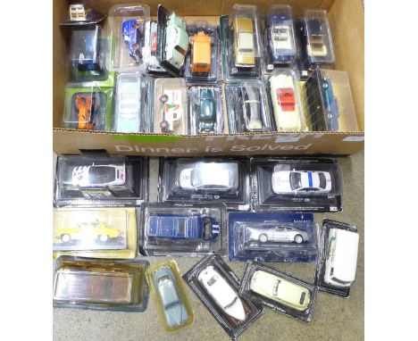 A collection of die-cast model vehicles, packaged, over 25 in total 