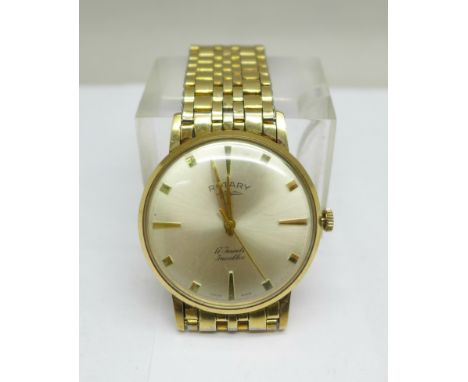 A 9ct gold cased Rotary wristwatch on a rolled gold bracelet, 33mm case 