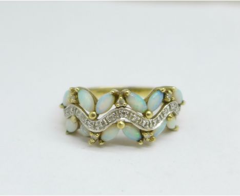 A 9ct gold, opal and diamond ring, 3.5g, S 