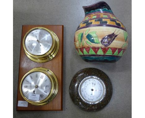 A jug, a serpentine barometer and a quartz clock and barometer **PLEASE NOTE THIS LOT IS NOT ELIGIBLE FOR POSTING AND PACKING