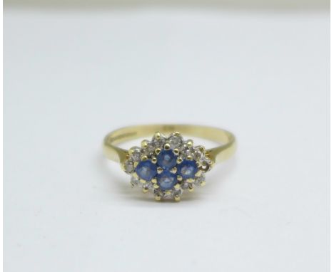 A 9ct gold, blue stone and diamond ring, 2.2g, R, lacking one diamond 