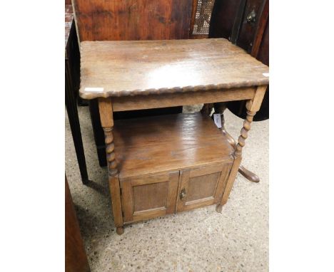 OAK FRAMED SIDE TABLE WITH OPEN SHELF WITH TWO CUPBOARD DOORS ON BARLEY TWIST SUPPORTS   