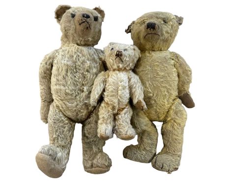 A trio of early 20th century 5-jointed Teddy Bears, including a small Merrythought. Well-loved, repaired and in need of resto