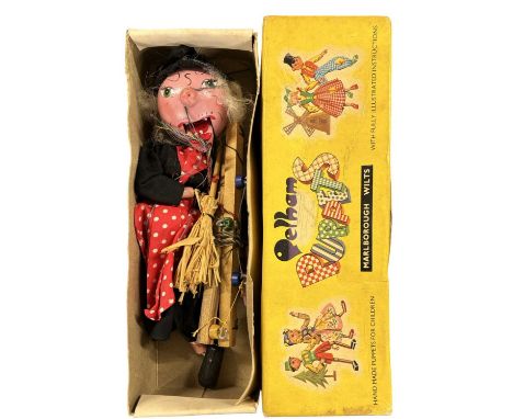 A boxed Pelham witch puppet