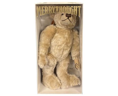 A boxed limited edition Merrythought Millenium teddy bear, number 1298/2000