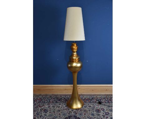A large modern decorative gilt standard lamp with central orb, height including fitting 124cm.