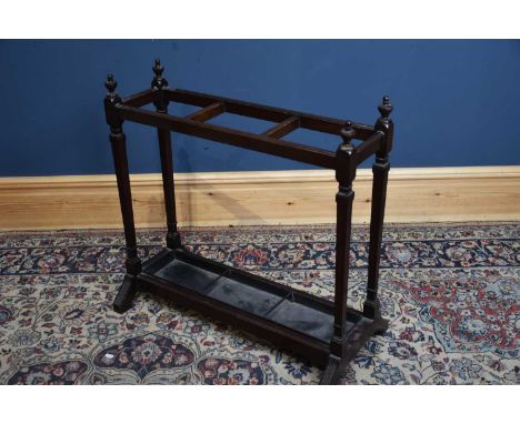 A 19th century three division mahogany stick stand with metal lining, height 74cm, width 76cm, depth 22cm.
