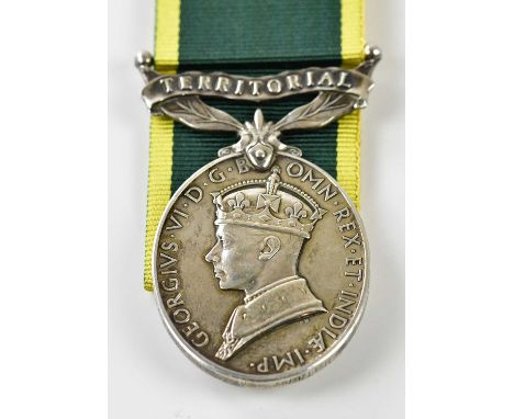 A George VI Territorial Efficiency Medal, awarded to 3655054 Private S. W. Miller Royal Army Ordnance Corps.