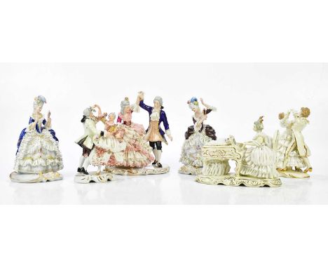 Six Continental figures of maidens and couple with crinoline type dresses, including a dancing couple, height 21cm, etc (6).C