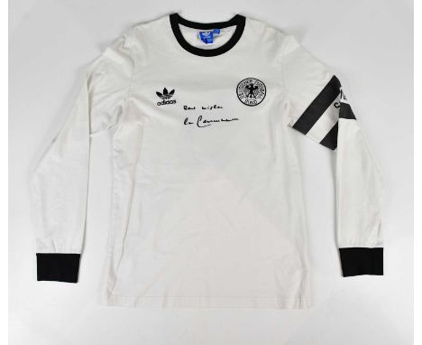 BECKENBAUER; a signed retro style Germany shirt, signed to the front, size M.Condition Report: Light creasing and general wea