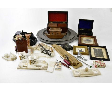 A mixed group of collectors' items including two pewter chargers, tea caddy, ebonised dressing table items, two spelter figur