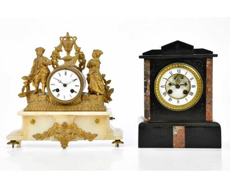 A late 19th century French gilt metal figural mantel clock, with urn finial flanked by a gentleman and lady and circular enam