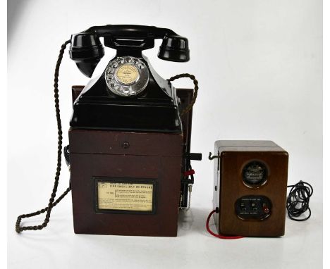 A black bakelite rotary GPO telephone, together with a Dictograph system sub station, serial number 21858.