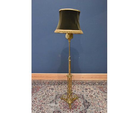 A late 19th century brass telescope standard lamp, height including shade 199cm.