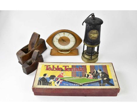 PROTECTOR LAMP &amp; LIGHTING; an Eccles miner's lamp, two wooden planes, a boxed table tennis set and a 1950s electric clock