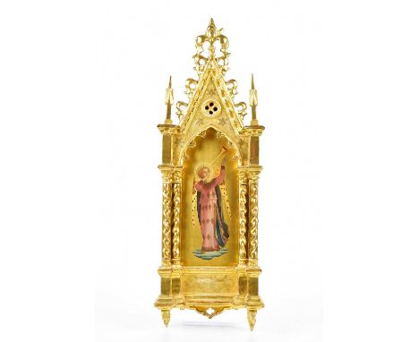 AFTER FRA ANGELICO; a late 19th century hand painted altar panel depicting an angel playing a horn, in a gilt pine orange fra