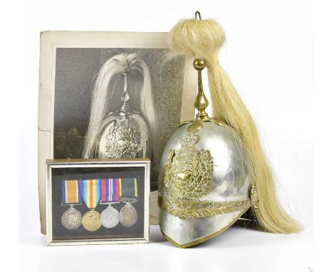 A Victorian Duke of Lancaster's Yeomanry (Albert) pattern helmet, with brass applied shield, with a matching set of medals aw