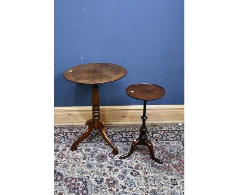 A 19th century oak tripod circular occasional table, height 75cm, diameter 52cm, together with a further mahogany wine table.