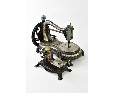 JONES; a vintage manual sewing machine, length 36cm, and a vintage tin plated child's sewing machine.