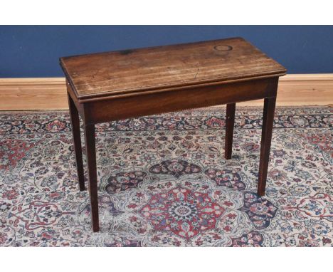 A 19th century mahogany single drawer inlaid fold-over tea table, height 69cm, width 91cm, depth 45cm.