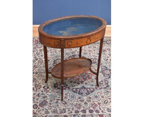 An Edwardian Sheraton Revival inlaid mahogany oval bijouterie table, with undertier, on tapered legs, height 80cm, width 75cm