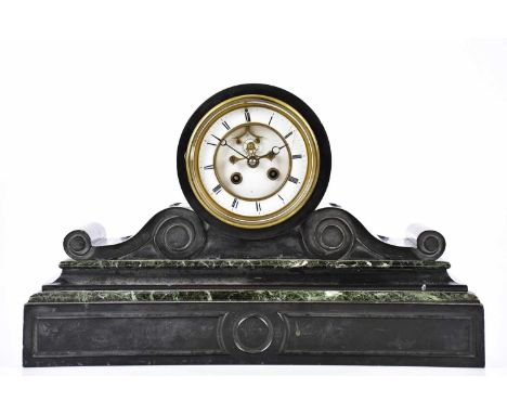 A Victorian marble and slate mantel clock, the circular dial set with Roman numerals, above scrolling motifs, on plinth base,