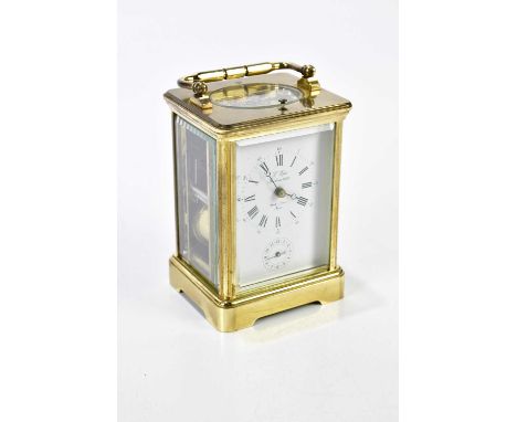 L'EPÉE; a French brass cased repeating carriage clock, the enamel dial set with Arabic and Roman numerals and subsidiary dial