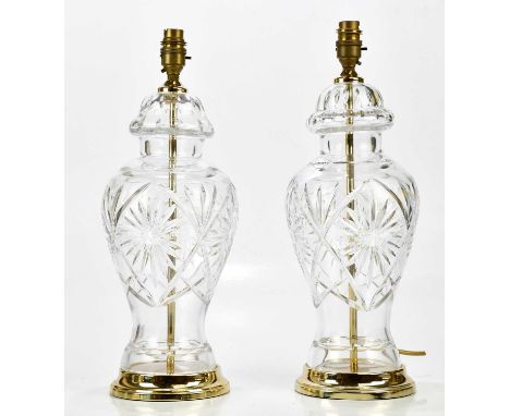 A pair of modern decorative cut glass table lamps on gilt bases, height 45cm (2).Condition Report: Scuffs and scratches to bo