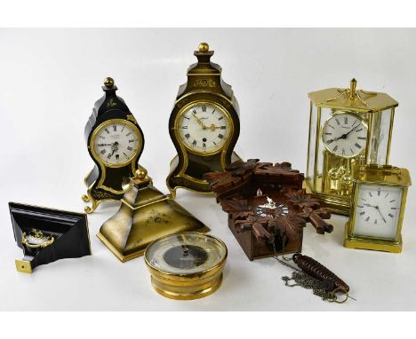 A collection of six modern clocks, to include a brass carriage clock, a carved wooden cuckoo clock and two bracket clocks, he